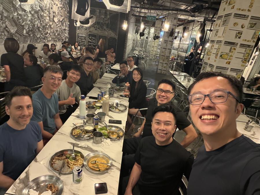 Marc's selfie with a group at dinner.