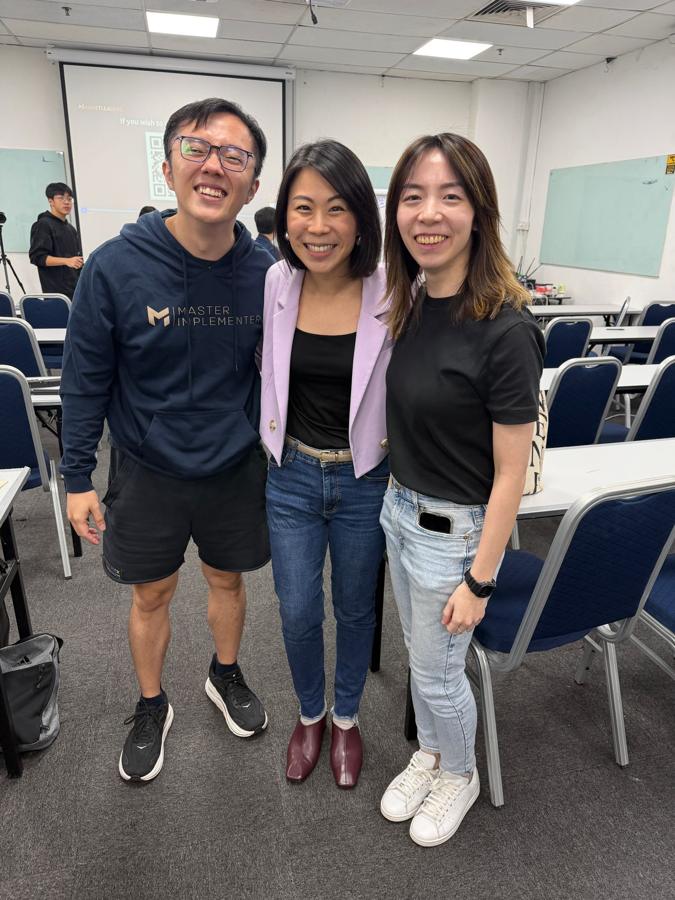 Marc with two people after a session.