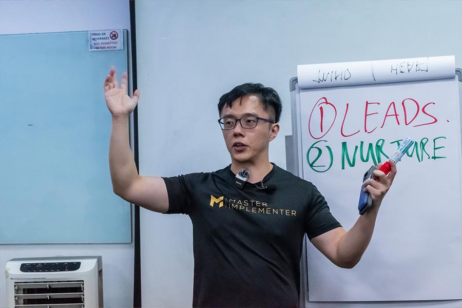 Marc at the whiteboard, leads and nurture.