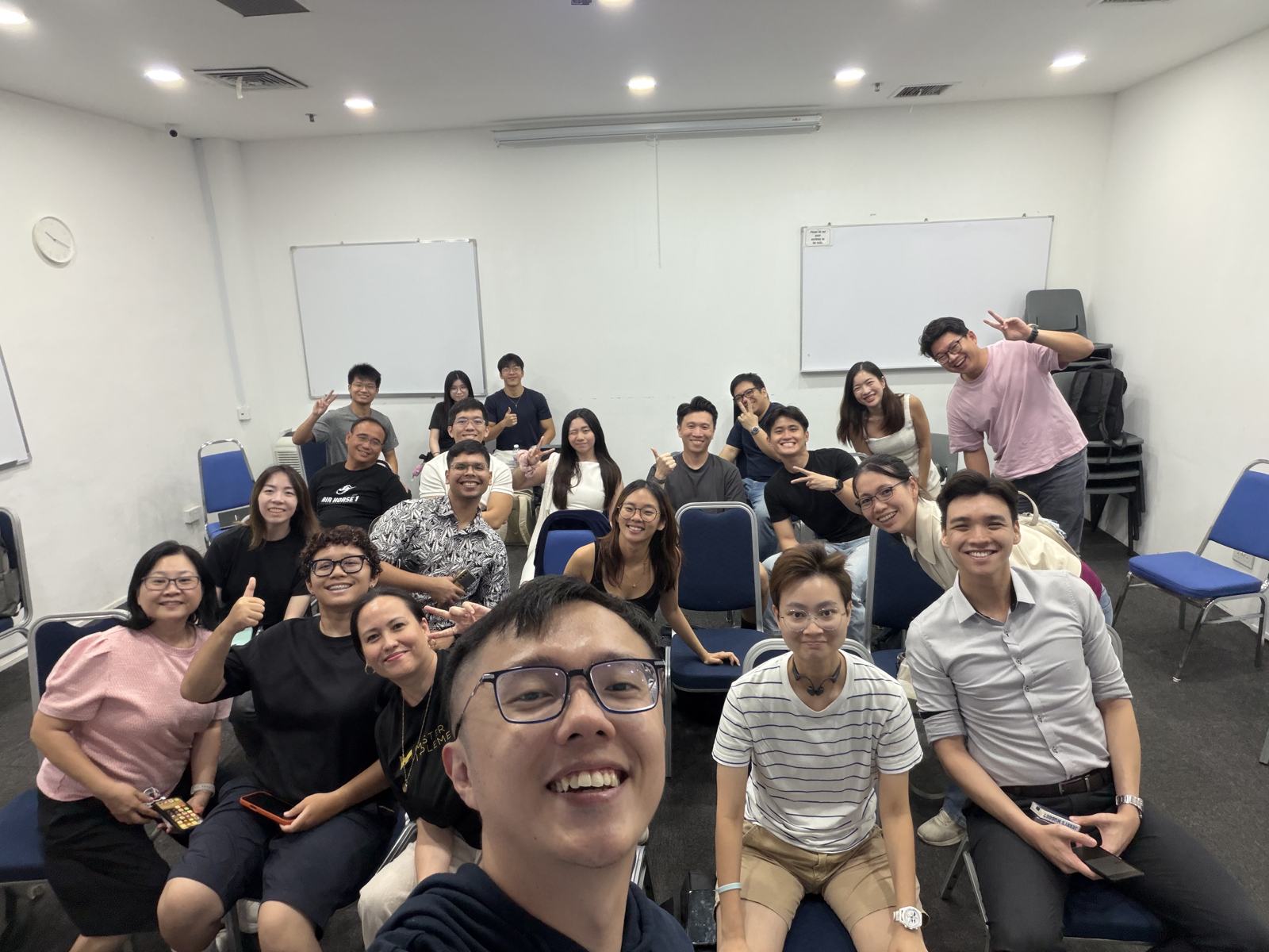 Marc Teo with Master Implementers clients at an evening event in Singapore.